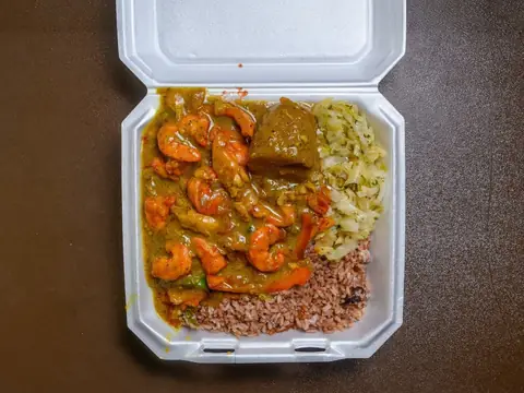 Oliver's Kitchen curry shrimp plate with rice and cabbage